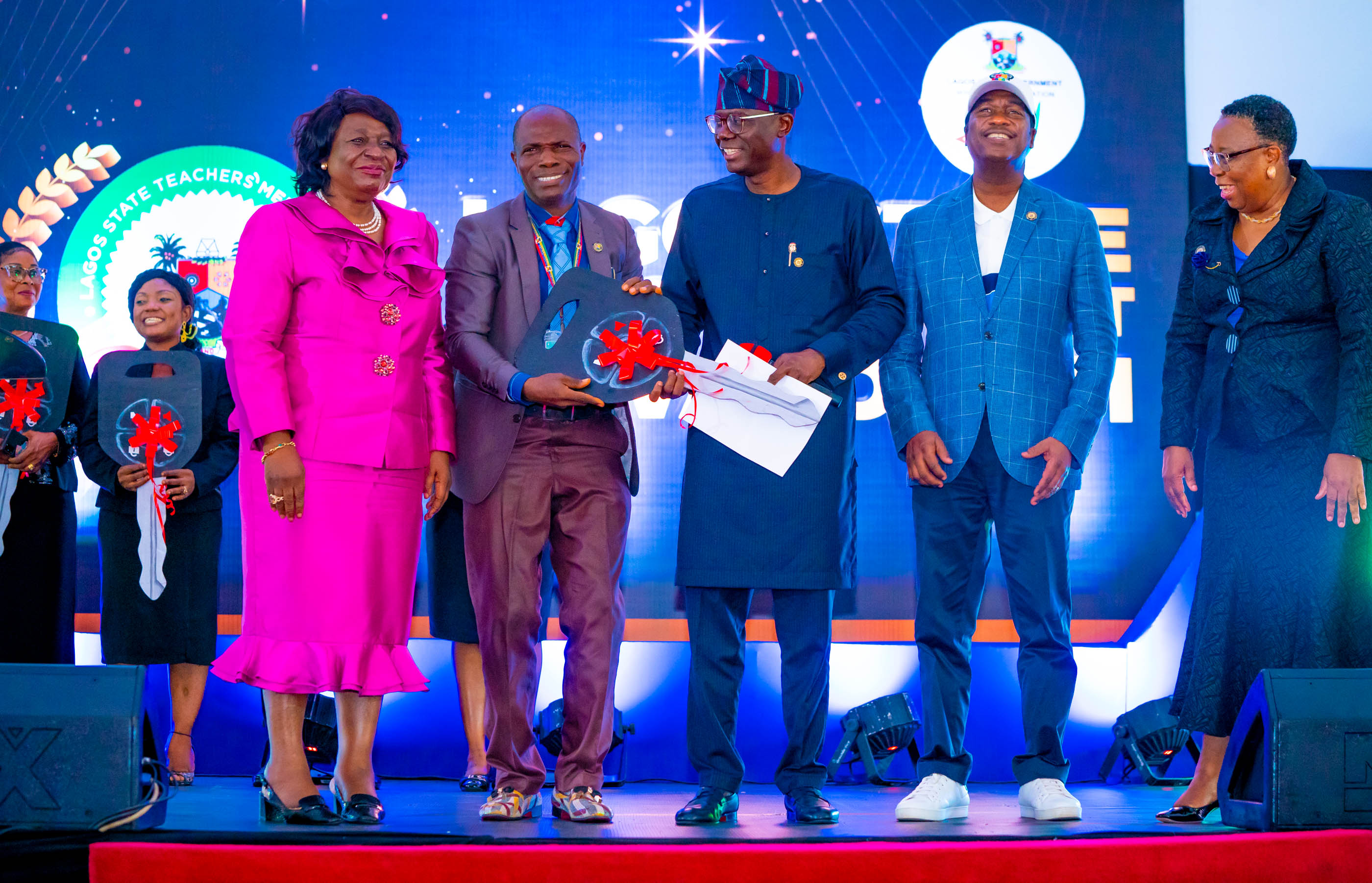 GOV. SANWO-OLU, HIS DEPUTY, DR HAMZAT AT THE YEAR 2021 ANNUAL TEACHERS’ MERIT AWARD